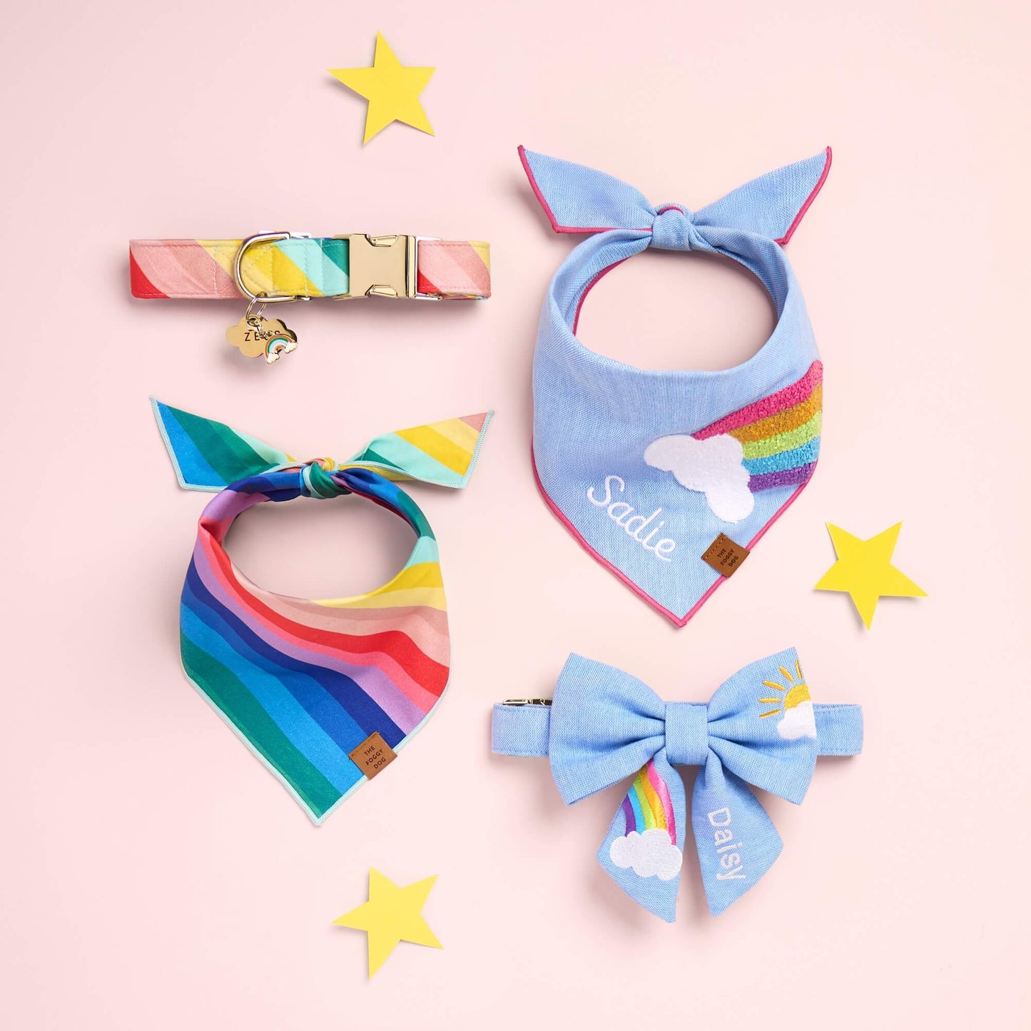 Over the Rainbow Dog Bandana, Collar,
Cloud Pet ID Tag, Rainbow Collar Charm,
Rainbow Applique Dog Bandana, and
Sunshine and Rainbows Embroidered Lady Bow Collar from The Foggy Dog