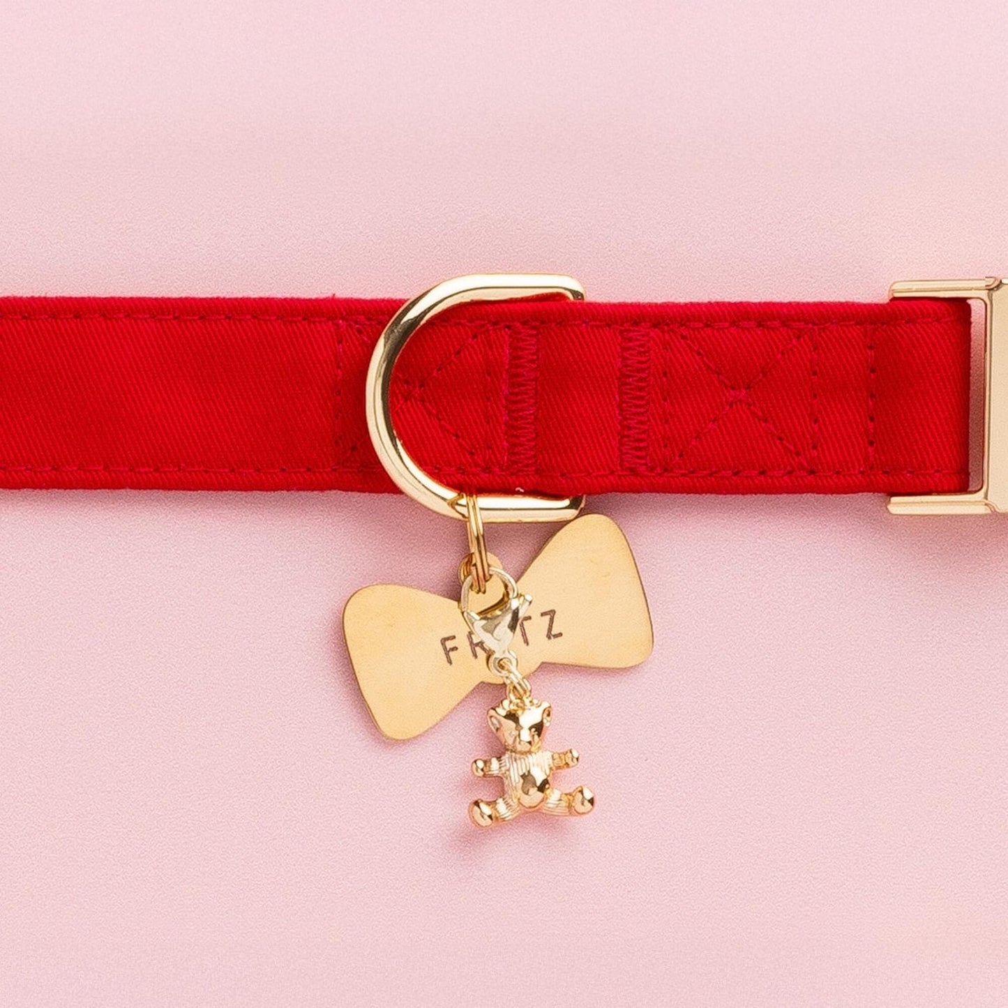 Ruby Dog Collar, Bow Tie ID Tag, and Gold Bear Charm from The Foggy Dog