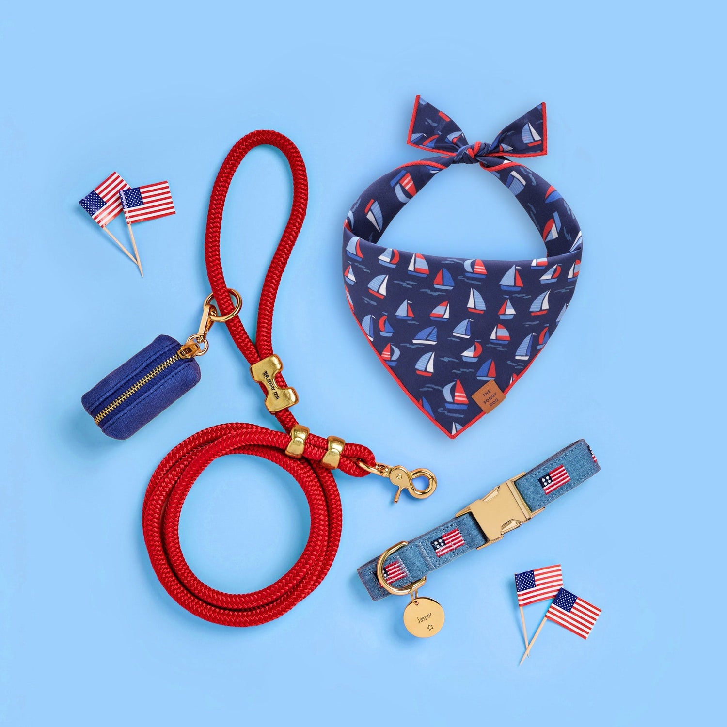 Regatta Dog Bandana, American Flag Embroidered Dog Collar, Ruby Marine Rope Leash, Ocean Waste Bag, and Circle Pet ID Tag from The Foggy Dog