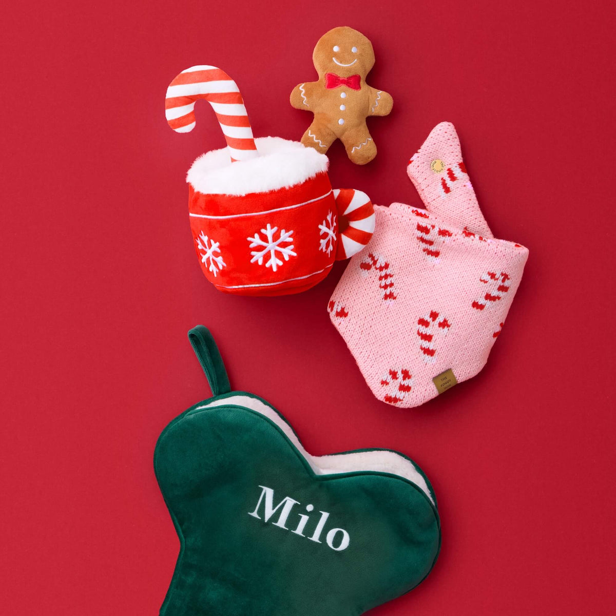 Holiday Hot Cocoa Toy, Pink Candy Canes Knit Dog Bandana and Forest Green Velvet Dog Christmas Stocking from The Foggy Dog