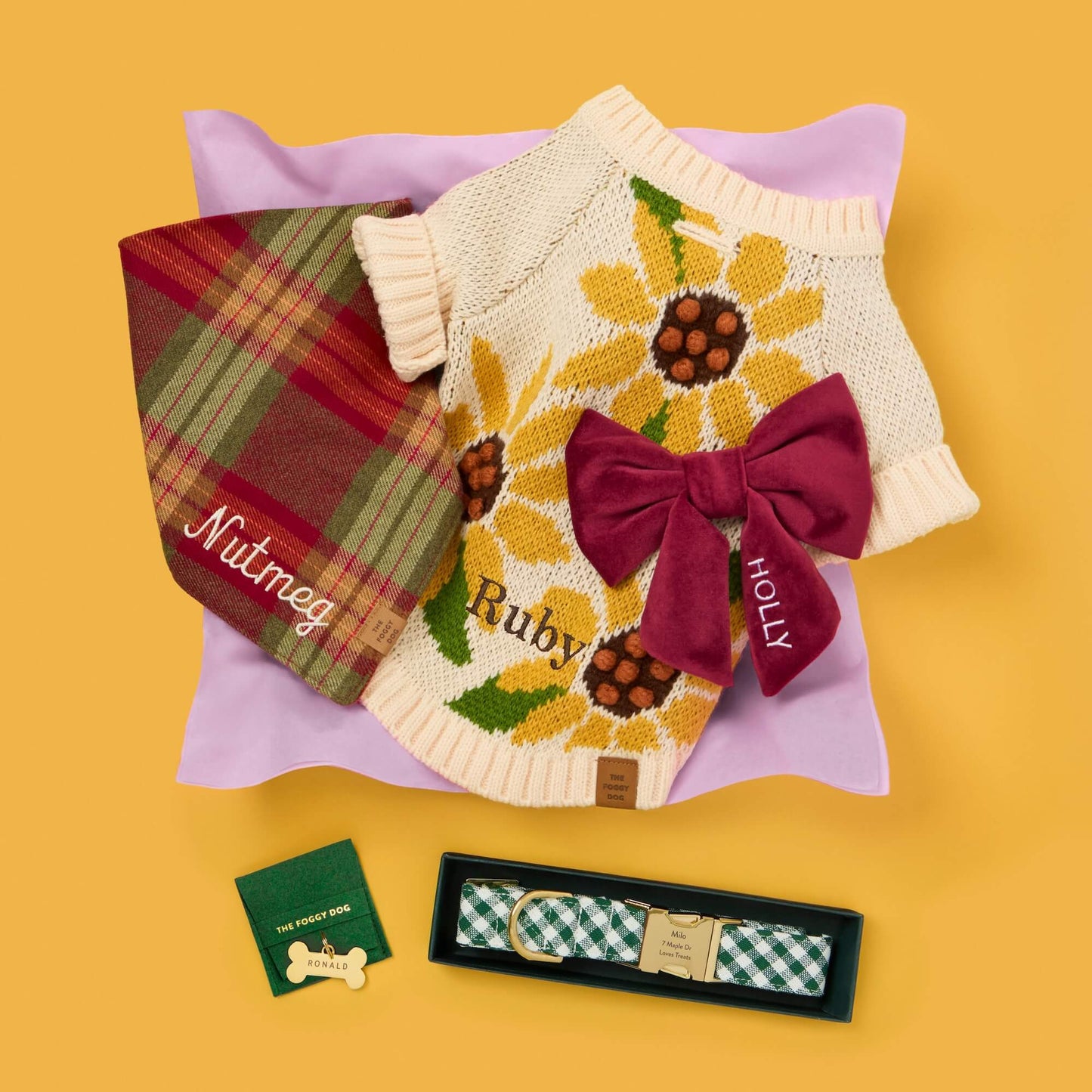 Sunflower Dog Sweater, Orchard Plaid Flannel Bandana, Burgundy Velvet Lady Bow Collar, Evergreen Gingham Collar and Bone Pet ID Tag from The Foggy Dog