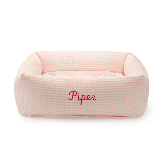 Blush Pink Gingham Bolster Dog Bed from The Foggy Dog