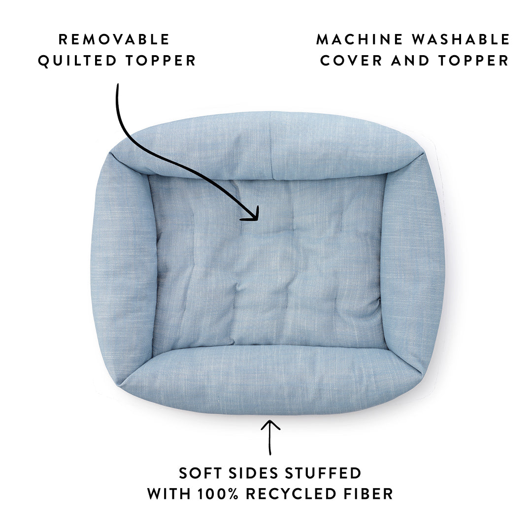 Chambray Blue Bolster Dog Bed from The Foggy Dog