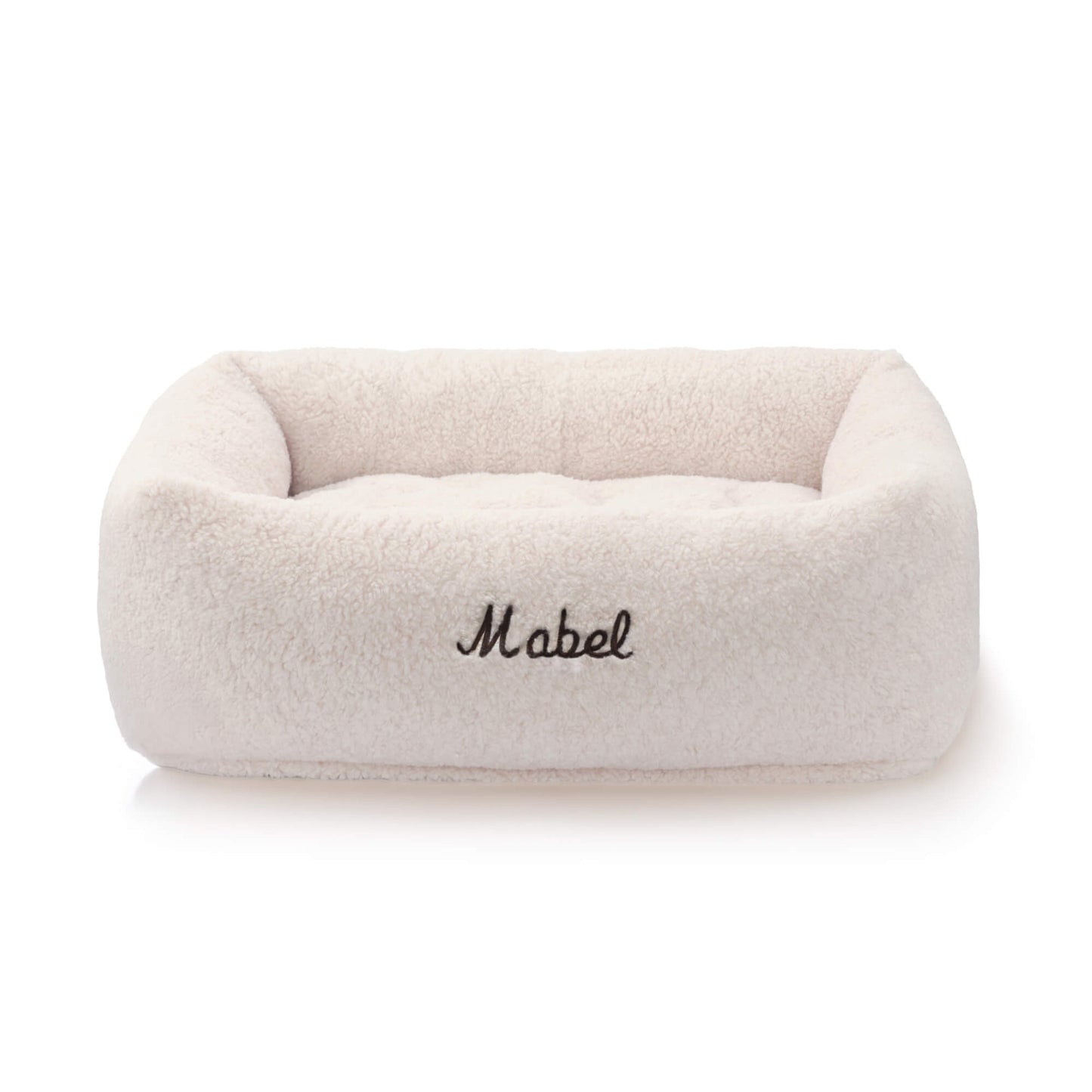 Ivory Recycled Sherpa Bolster Dog Bed from The Foggy Dog