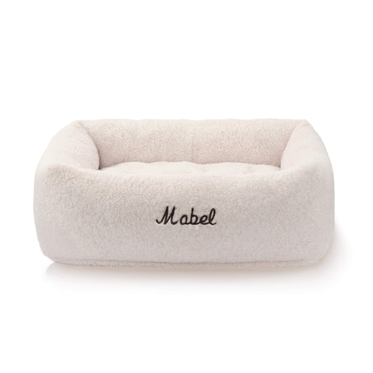 Ivory Recycled Sherpa Bolster Dog Bed from The Foggy Dog