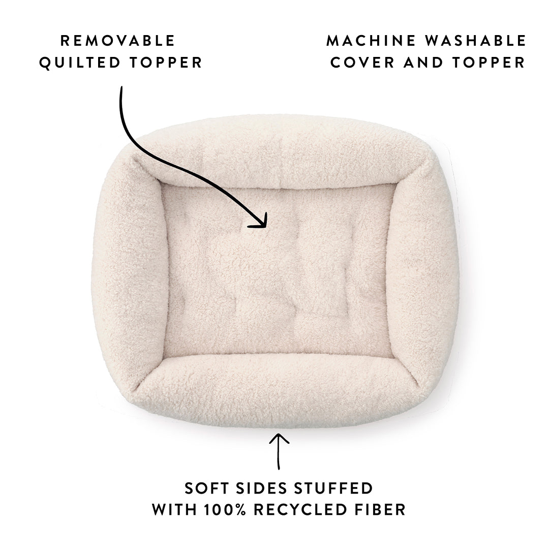 Ivory Recycled Sherpa Bolster Dog Bed from The Foggy Dog