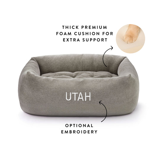 Pebble Gray Flannel Bolster Bed from The Foggy Dog
