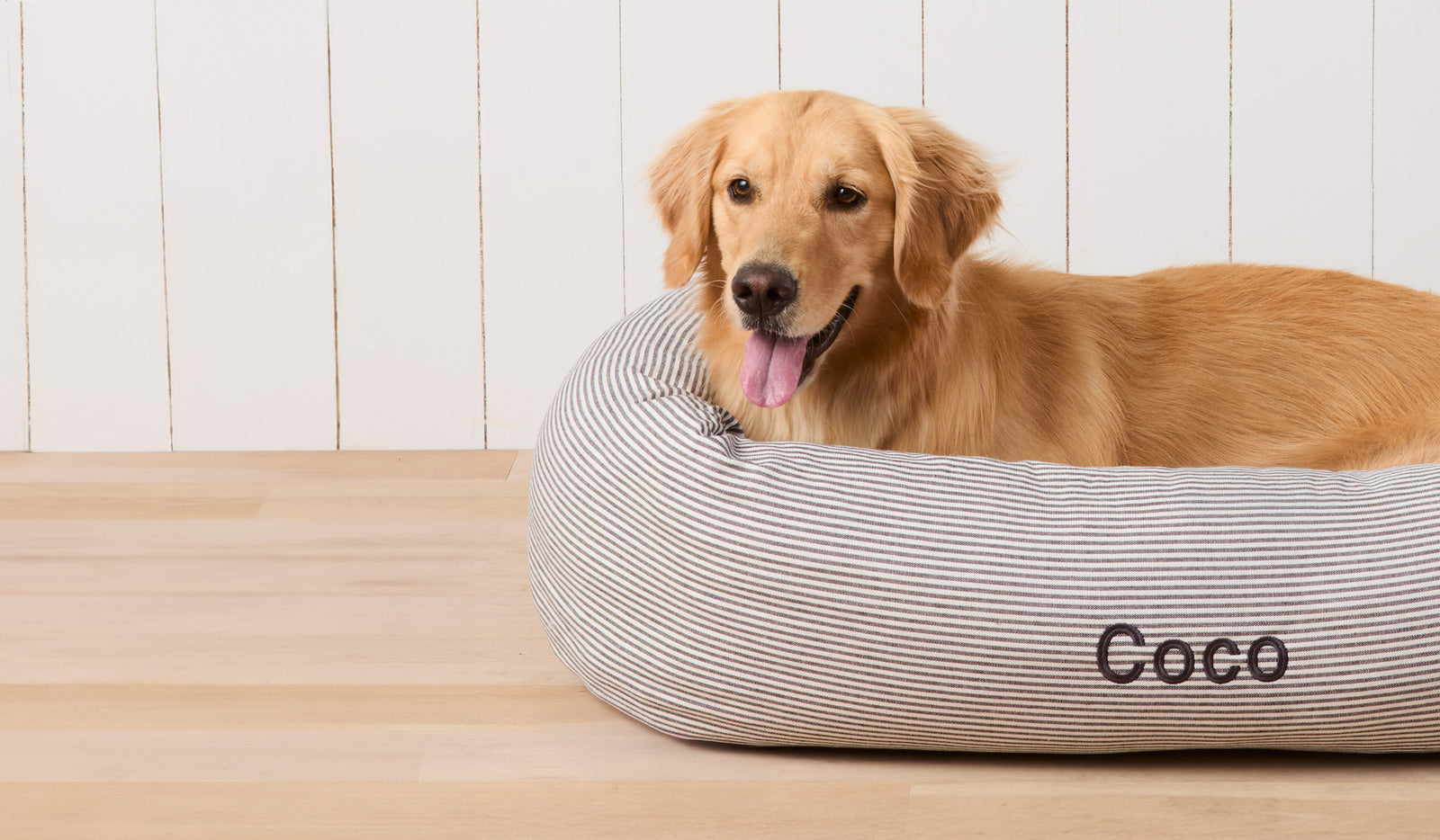 Charcoal Stripe Embroidered Bolster Dog Bed from The Foggy Dog