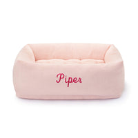 Blush Pink Bolster Dog Bed from The Foggy Dog