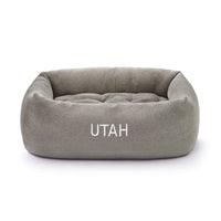 Pebble Gray Flannel Bolster Bed from The Foggy Dog