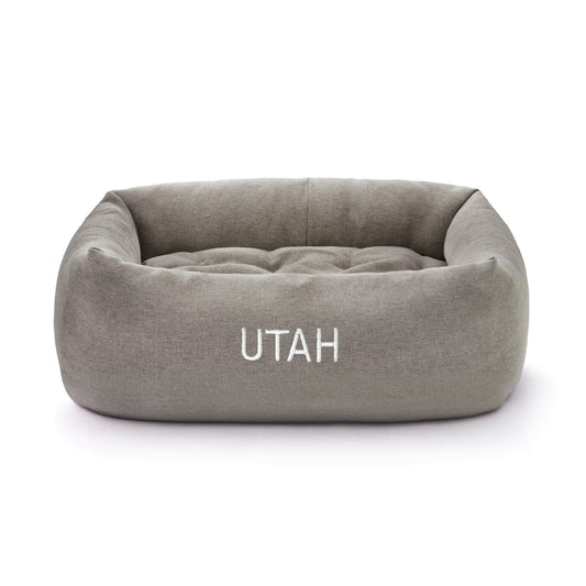 Pebble Gray Flannel Bolster Bed from The Foggy Dog