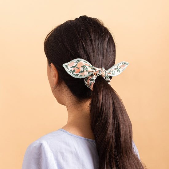 Peaches and Cream Bow Scrunchie from The Foggy Dog 
